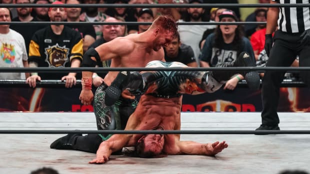 Will Ospreay drops Kenny Omega on his head with a Tiger Driver